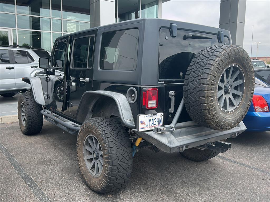 used 2015 Jeep Wrangler Unlimited car, priced at $21,981