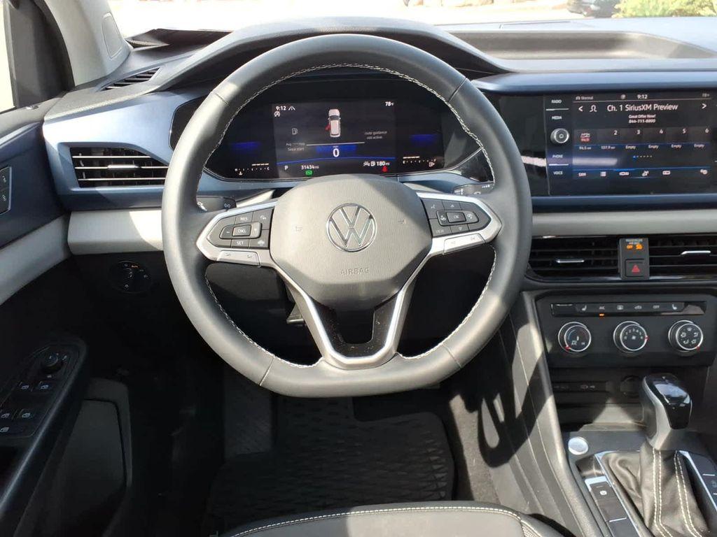 used 2022 Volkswagen Taos car, priced at $24,997