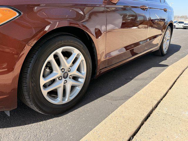 used 2016 Ford Fusion car, priced at $12,995