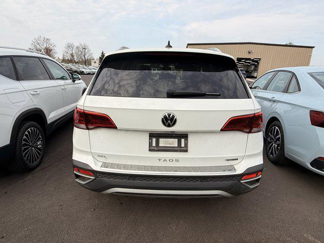 used 2023 Volkswagen Taos car, priced at $24,995