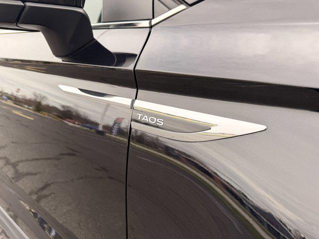 used 2023 Volkswagen Taos car, priced at $23,103
