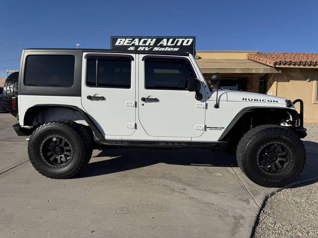 used 2014 Jeep Wrangler Unlimited car, priced at $24,995