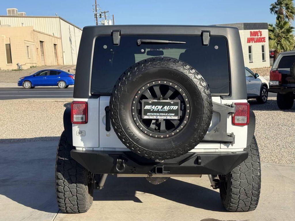 used 2014 Jeep Wrangler Unlimited car, priced at $24,995