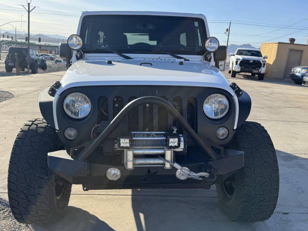 used 2014 Jeep Wrangler Unlimited car, priced at $24,995