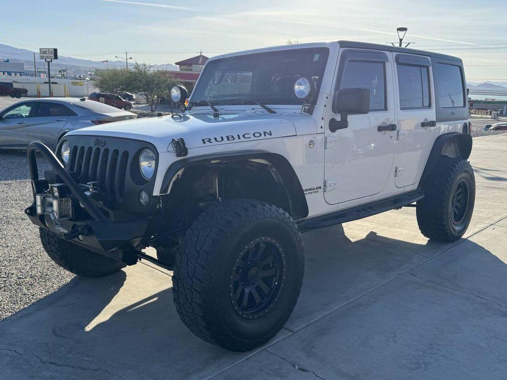 used 2014 Jeep Wrangler Unlimited car, priced at $24,995