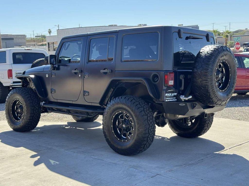 used 2013 Jeep Wrangler Unlimited car, priced at $22,995