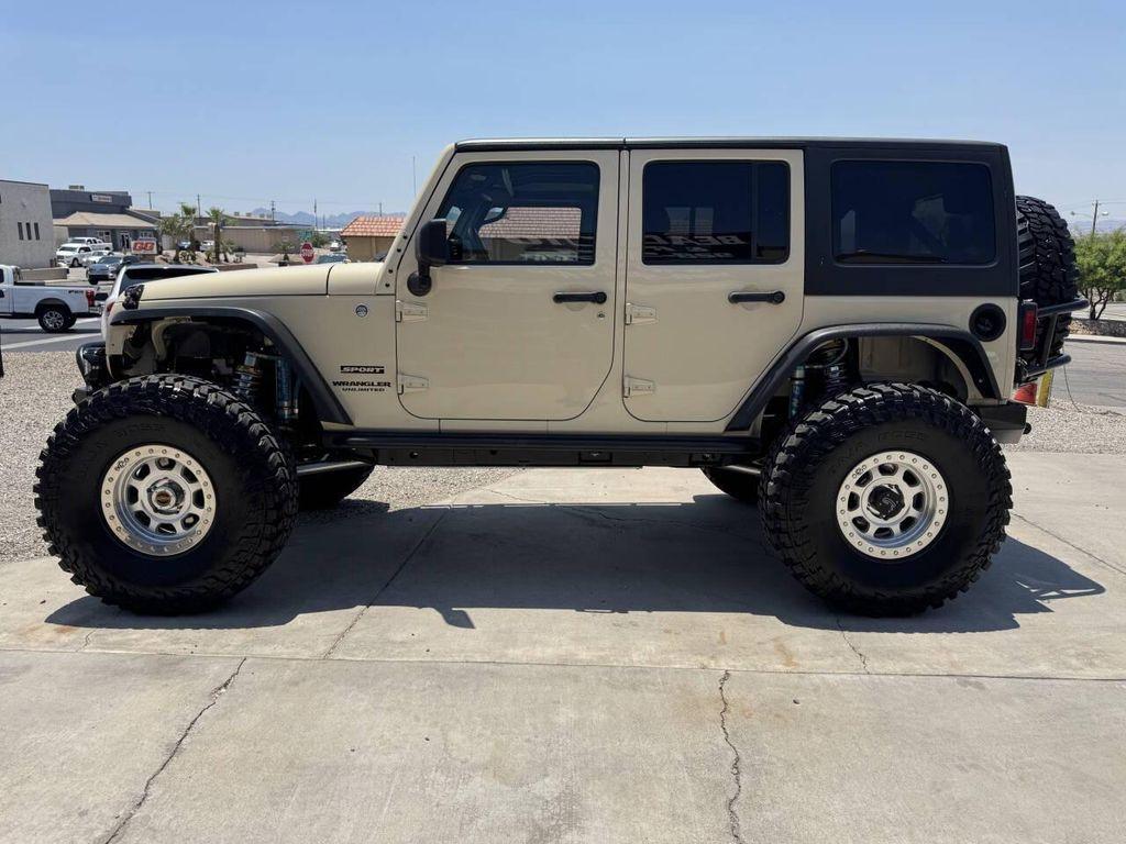 used 2011 Jeep Wrangler Unlimited car, priced at $199,999