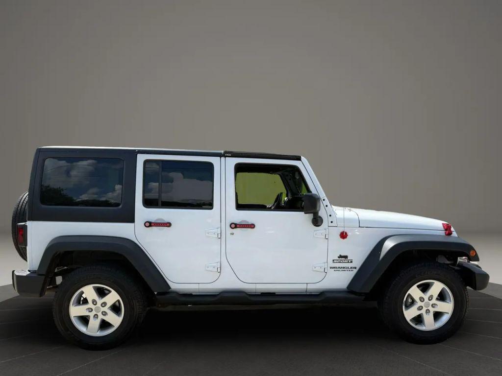 used 2014 Jeep Wrangler Unlimited car, priced at $18,495