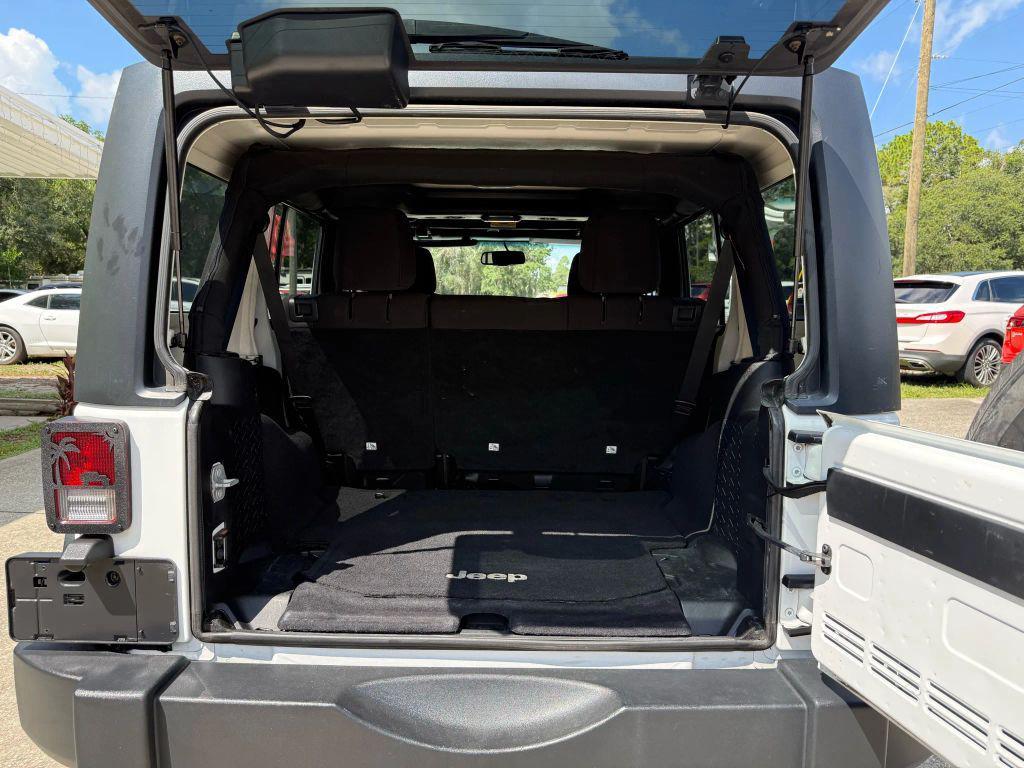 used 2014 Jeep Wrangler Unlimited car, priced at $18,495