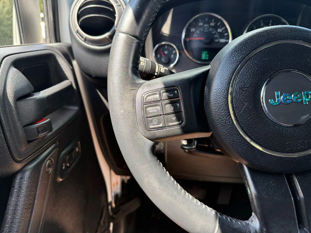 used 2014 Jeep Wrangler Unlimited car, priced at $18,495