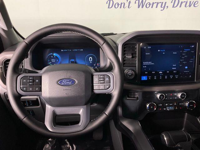 used 2025 Ford F-150 Lightning car, priced at $49,249