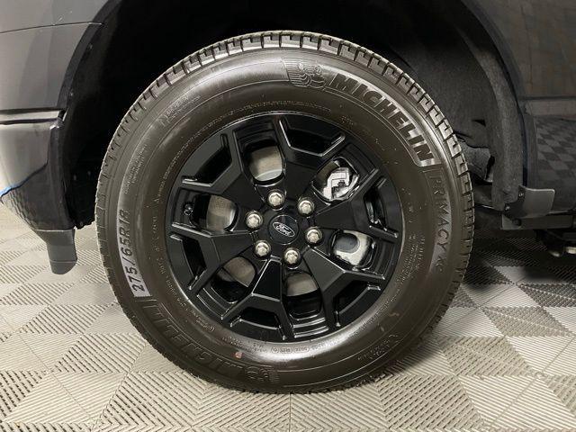 used 2025 Ford F-150 Lightning car, priced at $49,249