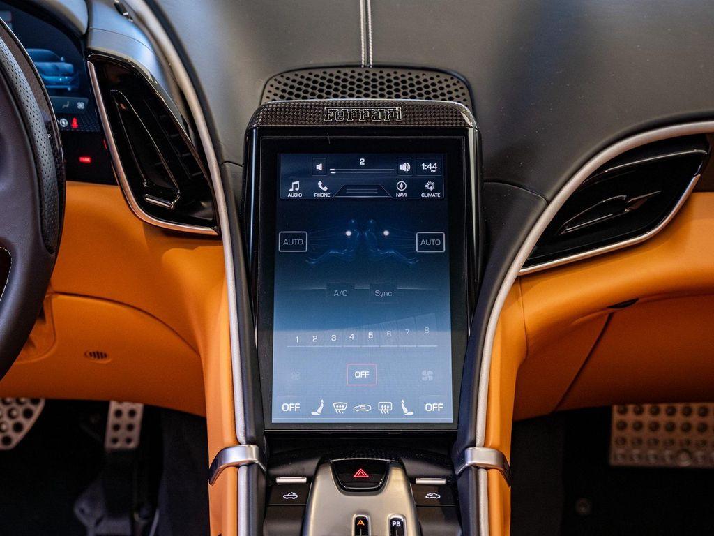 used 2024 Ferrari Roma Spider car, priced at $303,899