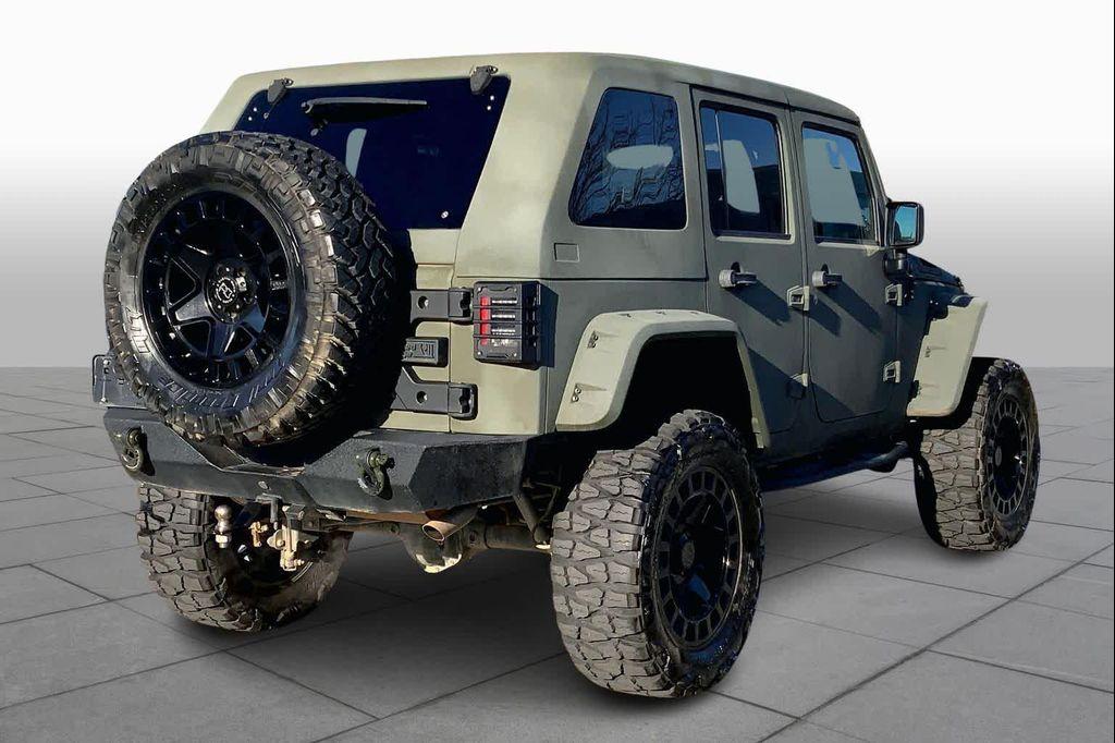 used 2017 Jeep Wrangler Unlimited car, priced at $24,586