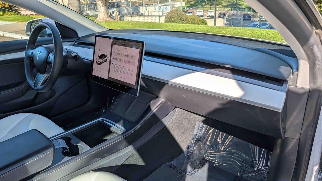 used 2022 Tesla Model 3 car, priced at $23,497