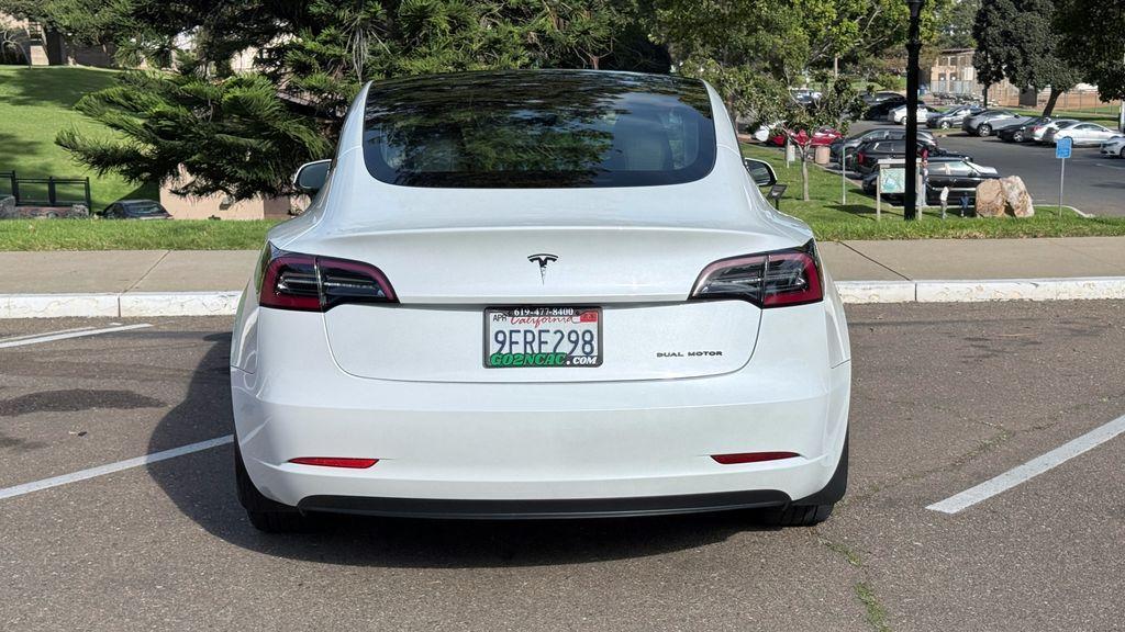 used 2023 Tesla Model 3 car, priced at $21,495