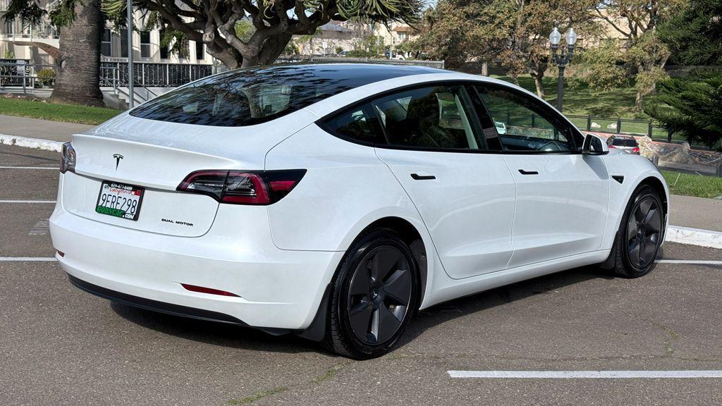used 2023 Tesla Model 3 car, priced at $21,495