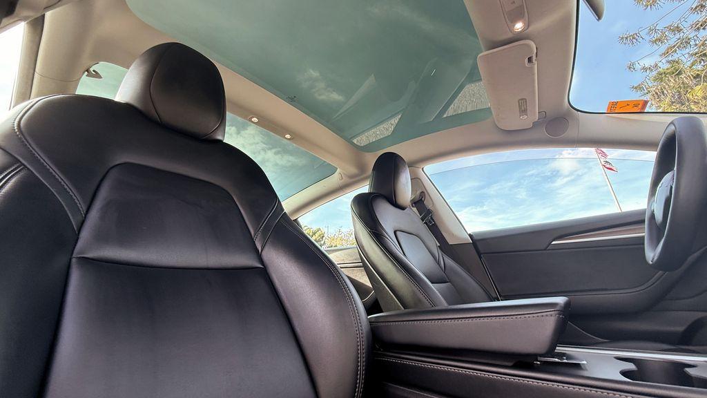 used 2023 Tesla Model 3 car, priced at $21,495