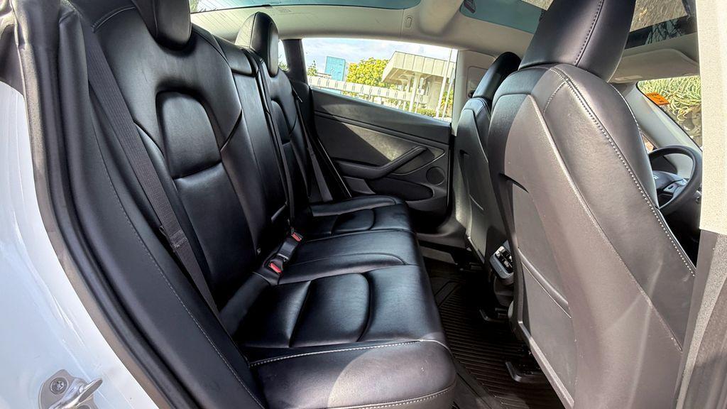 used 2023 Tesla Model 3 car, priced at $21,495