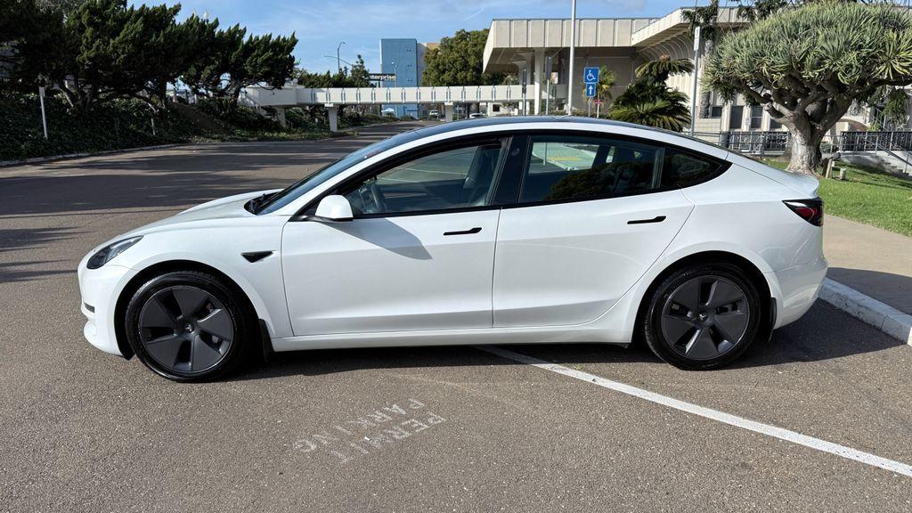 used 2023 Tesla Model 3 car, priced at $21,495