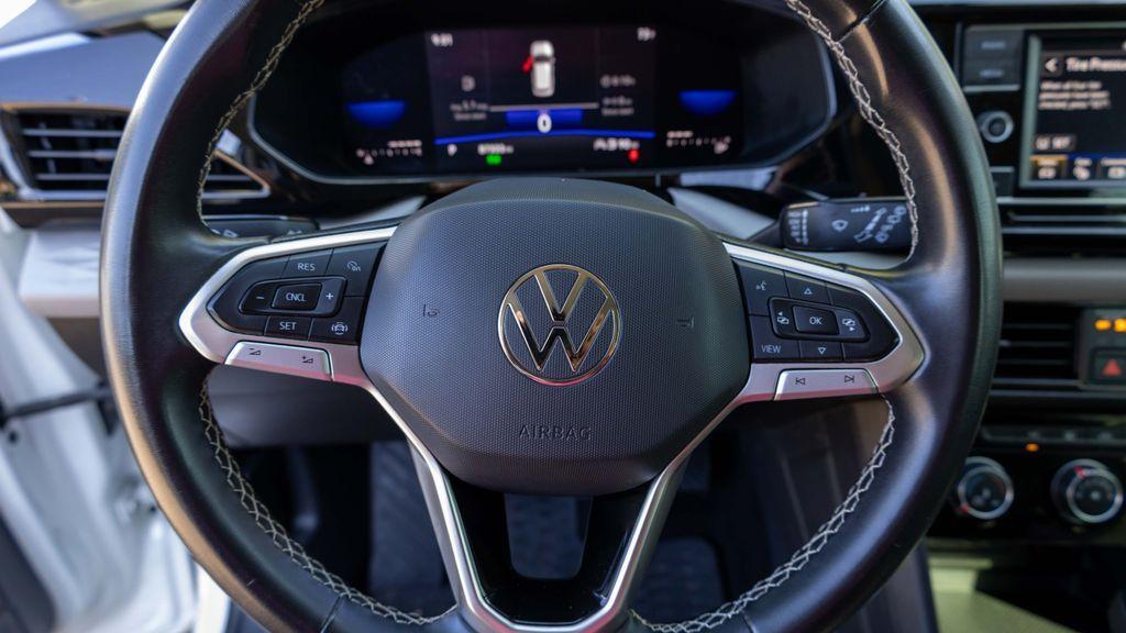 used 2023 Volkswagen Taos car, priced at $15,995
