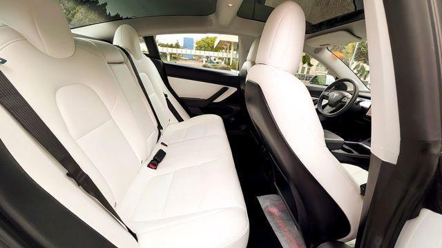 used 2021 Tesla Model 3 car, priced at $27,995