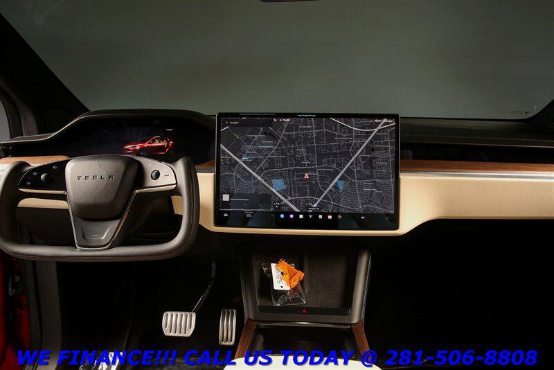 used 2023 Tesla Model X car, priced at $56,220