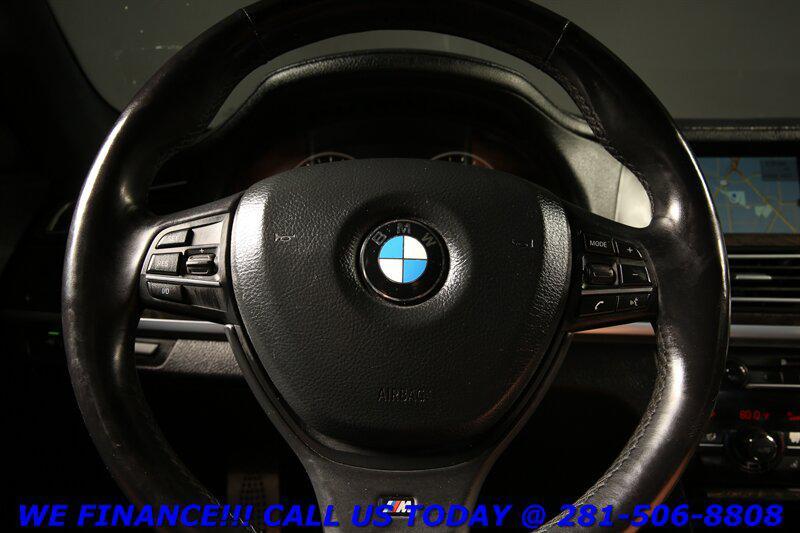used 2012 BMW 750 car, priced at $12,720