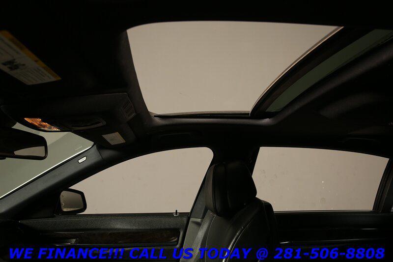 used 2012 BMW 750 car, priced at $12,720