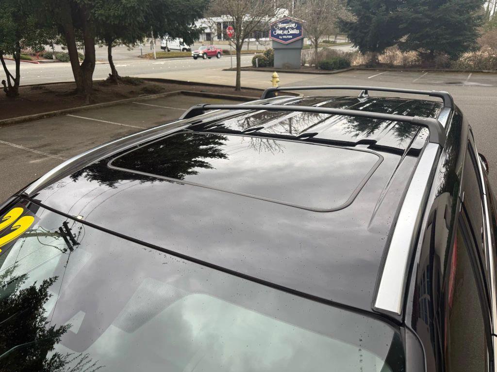 used 2022 Toyota Highlander Hybrid car, priced at $28,990