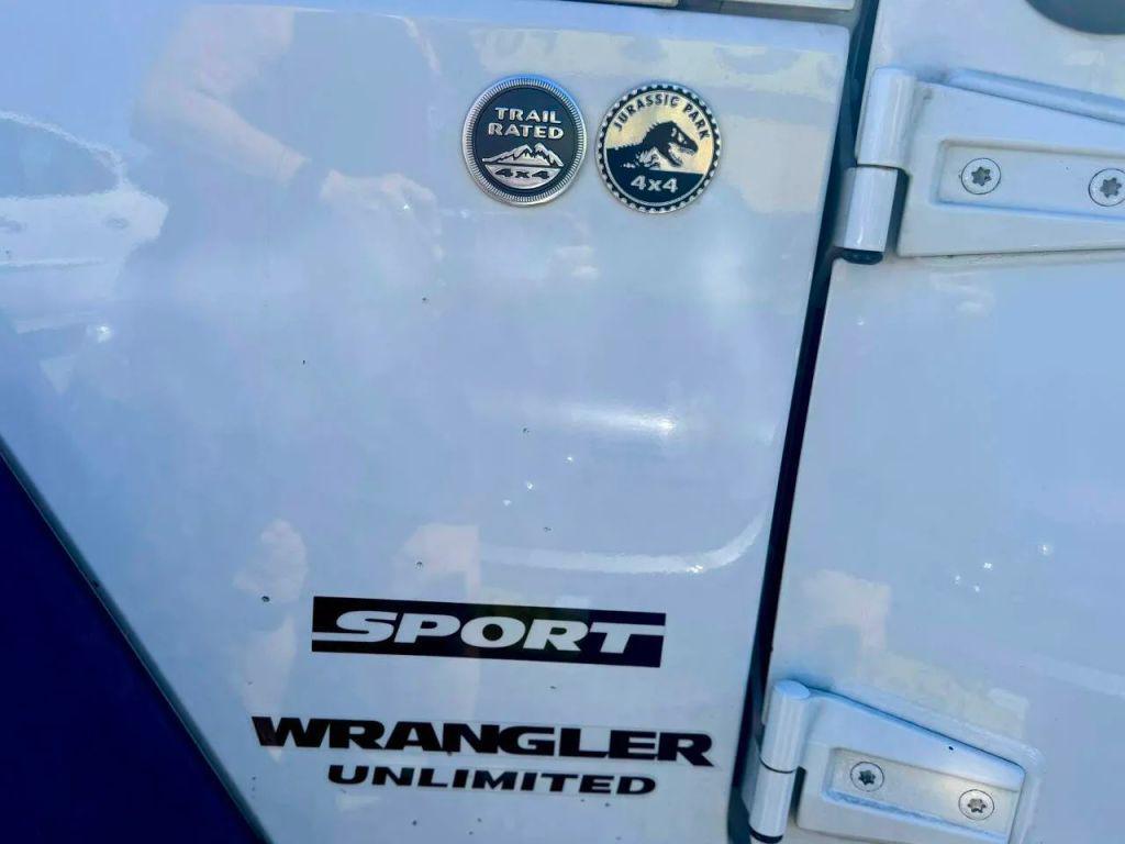used 2015 Jeep Wrangler Unlimited car, priced at $16,995