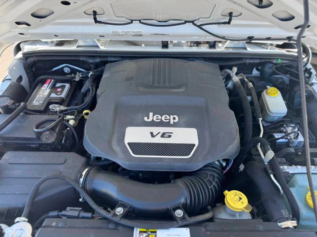 used 2015 Jeep Wrangler Unlimited car, priced at $16,995