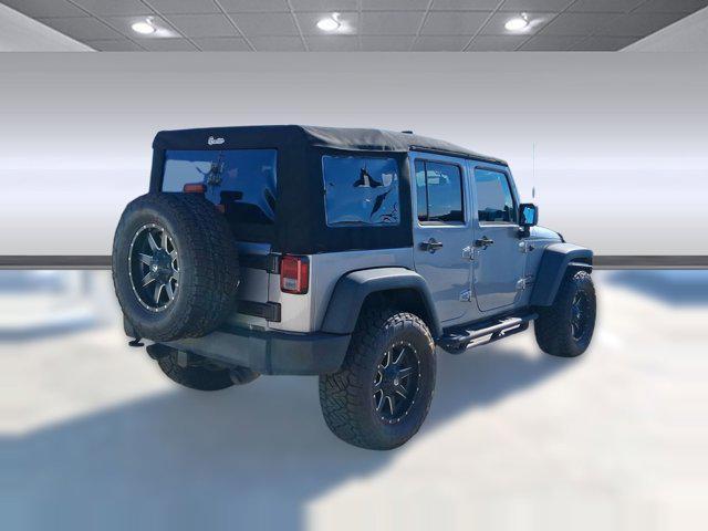 used 2014 Jeep Wrangler Unlimited car, priced at $19,586