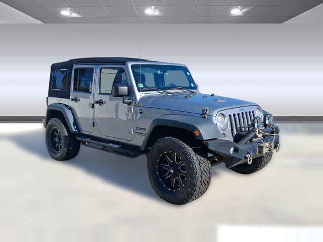 used 2014 Jeep Wrangler Unlimited car, priced at $19,586