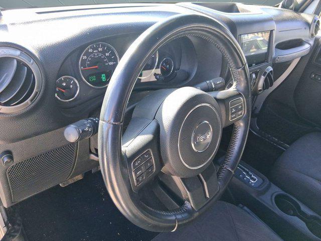 used 2014 Jeep Wrangler Unlimited car, priced at $19,586