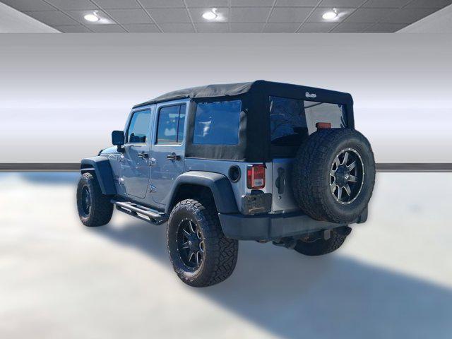 used 2014 Jeep Wrangler Unlimited car, priced at $19,586