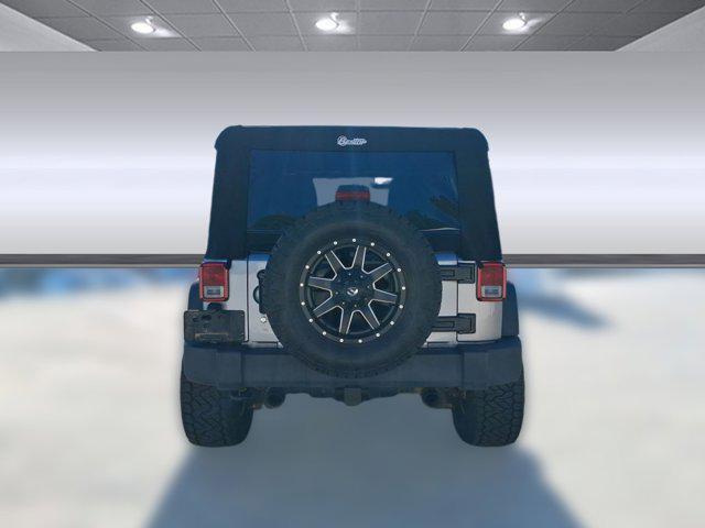 used 2014 Jeep Wrangler Unlimited car, priced at $19,586