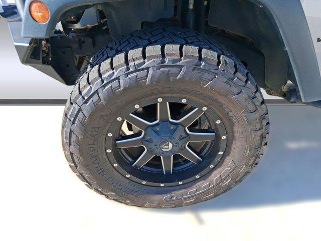 used 2014 Jeep Wrangler Unlimited car, priced at $19,586