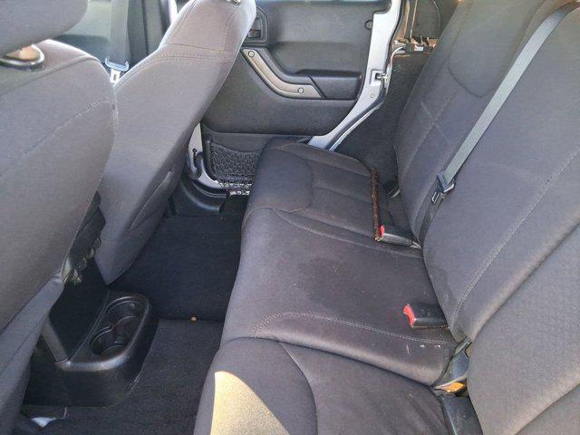 used 2014 Jeep Wrangler Unlimited car, priced at $19,586