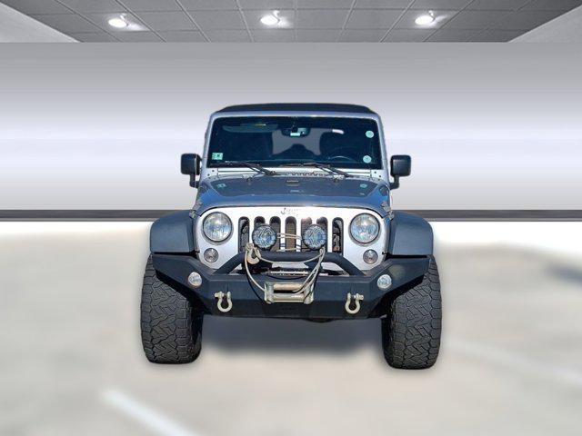 used 2014 Jeep Wrangler Unlimited car, priced at $19,586