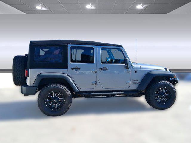 used 2014 Jeep Wrangler Unlimited car, priced at $19,586