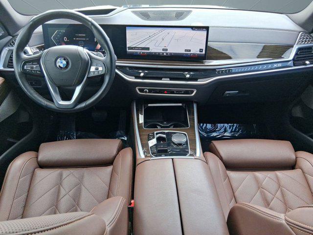 used 2024 BMW X5 car, priced at $49,097