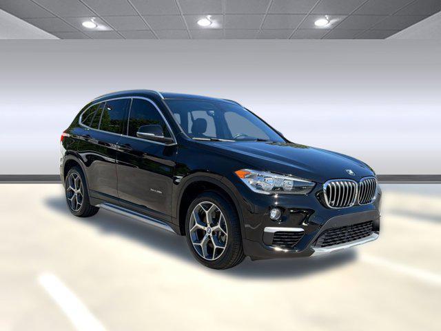 used 2018 BMW X1 car, priced at $15,097
