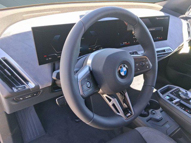 new 2026 BMW iX car, priced at $98,870