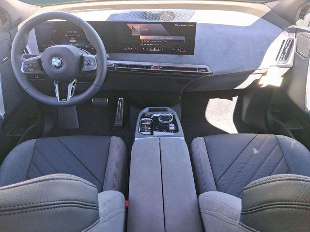 new 2026 BMW iX car, priced at $98,870