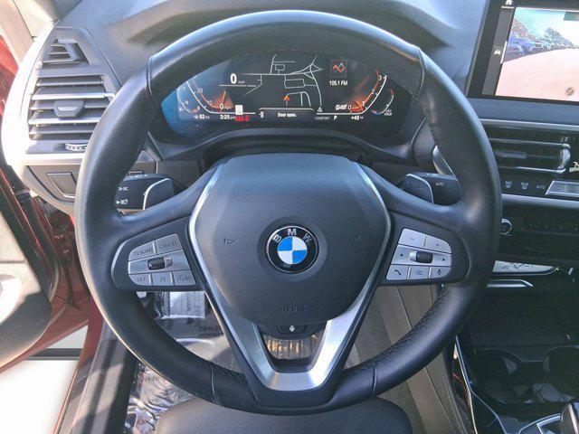used 2023 BMW X4 car, priced at $39,597