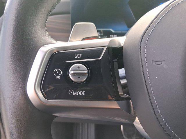 used 2025 BMW 750e car, priced at $99,986