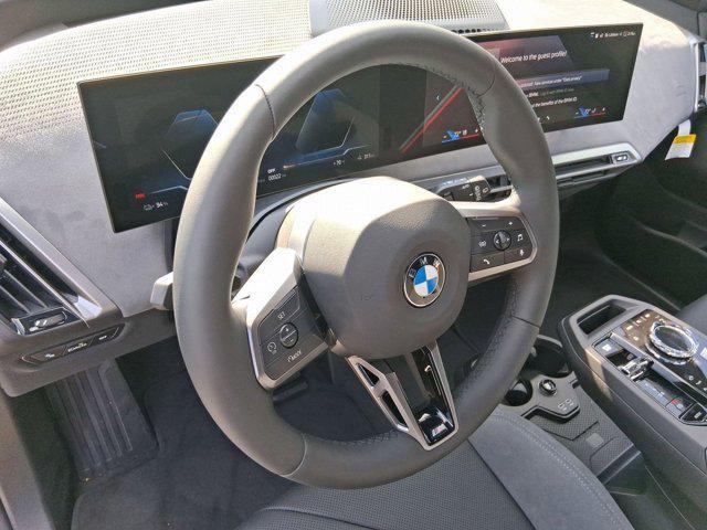 new 2026 BMW iX car, priced at $102,145