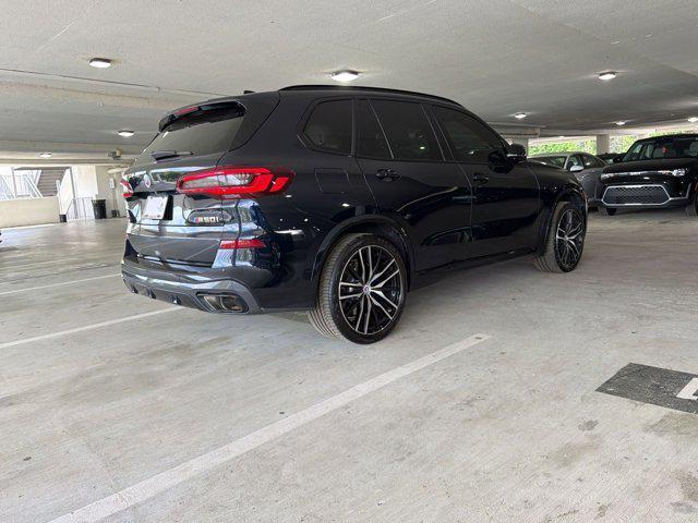 used 2023 BMW X5 car, priced at $62,097