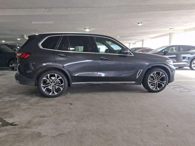 used 2023 BMW X5 car, priced at $42,097